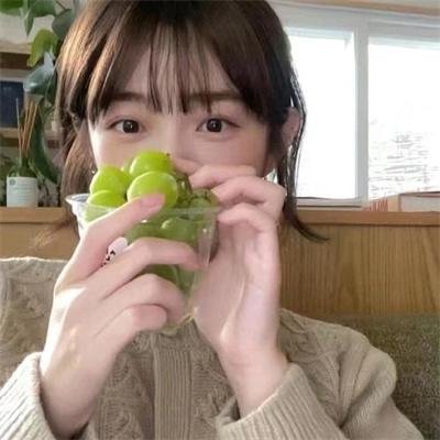 桃花含露又春风